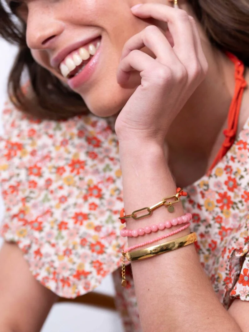Armband mit rechteckigen Gliedern aus orangefarbenem Seil