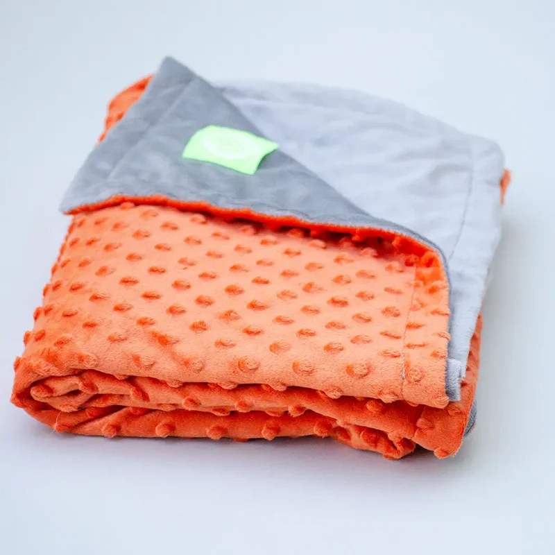 Die hochwertige Wendedecke "2 Sides" orange-grau