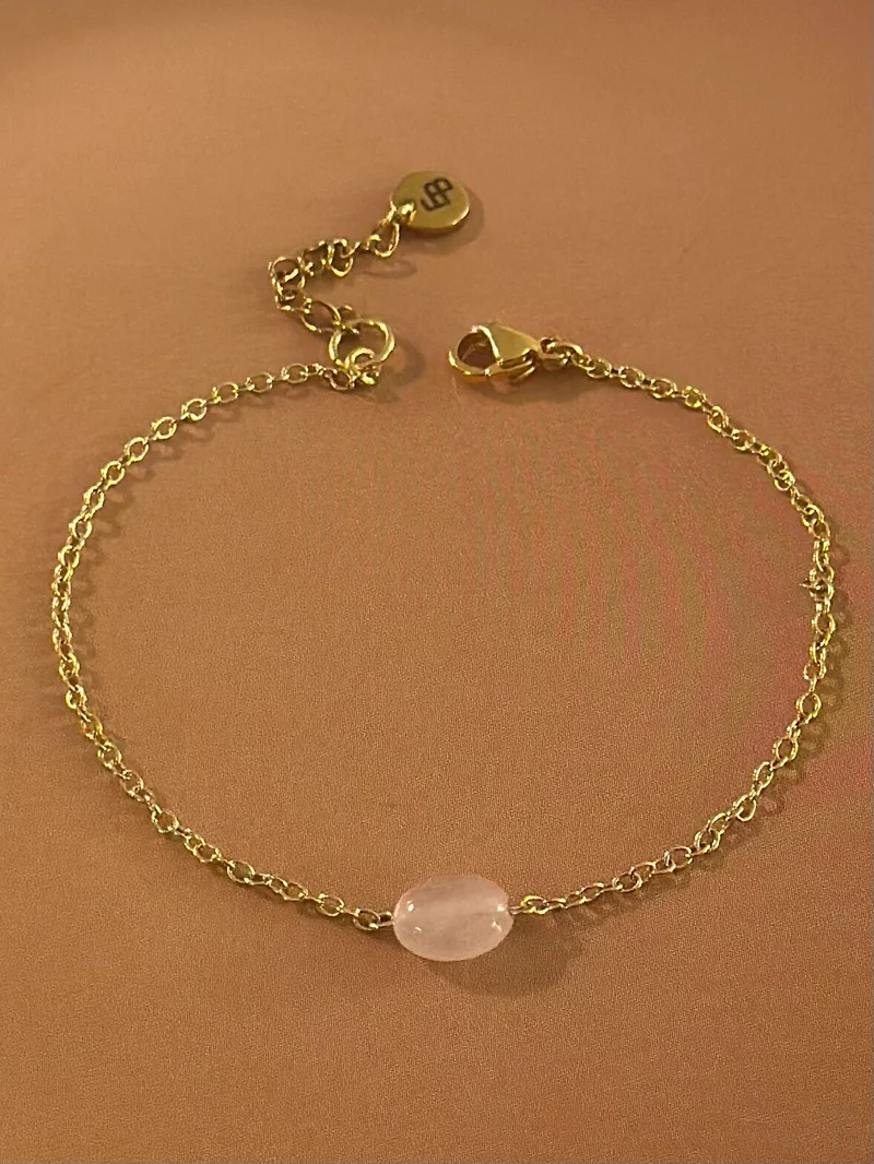 Armband aus hellrosa, feinem ovalen Edelstein